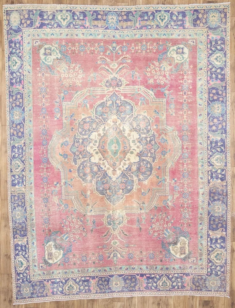 Hand Knotted Wool Floral Oriental Area Rug 8'10 x 11'11: Hand Knotted Wool Floral Oriental Area Rug 8'10 x 11'11 This semi-antique hand-knotted wool rug features a classic oriental floral pattern in muted tones of red, plum, pastel brown, green, and light b