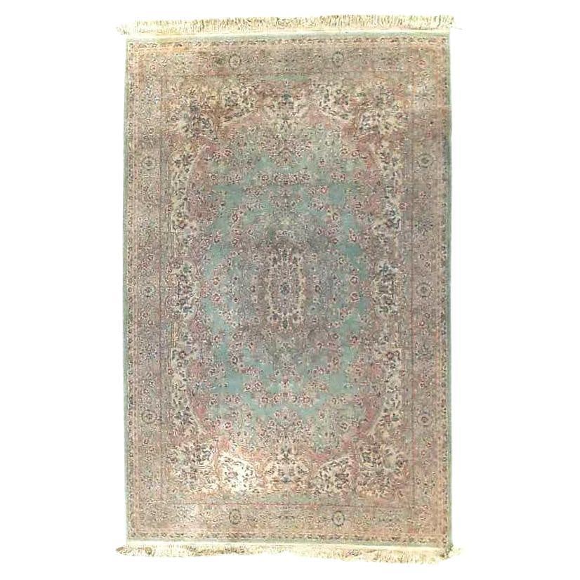 115 x 69.5 Inch Kirman Style Mint Green Wool Rug Circa 1950: 115 x 69.5 Inch Kirman Style Mint Green Wool Rug Circa 1950 This vintage Karastan Kirman Persian wool carpet from around 1950 features a mint green field adorned with intricate floral and medallion pa