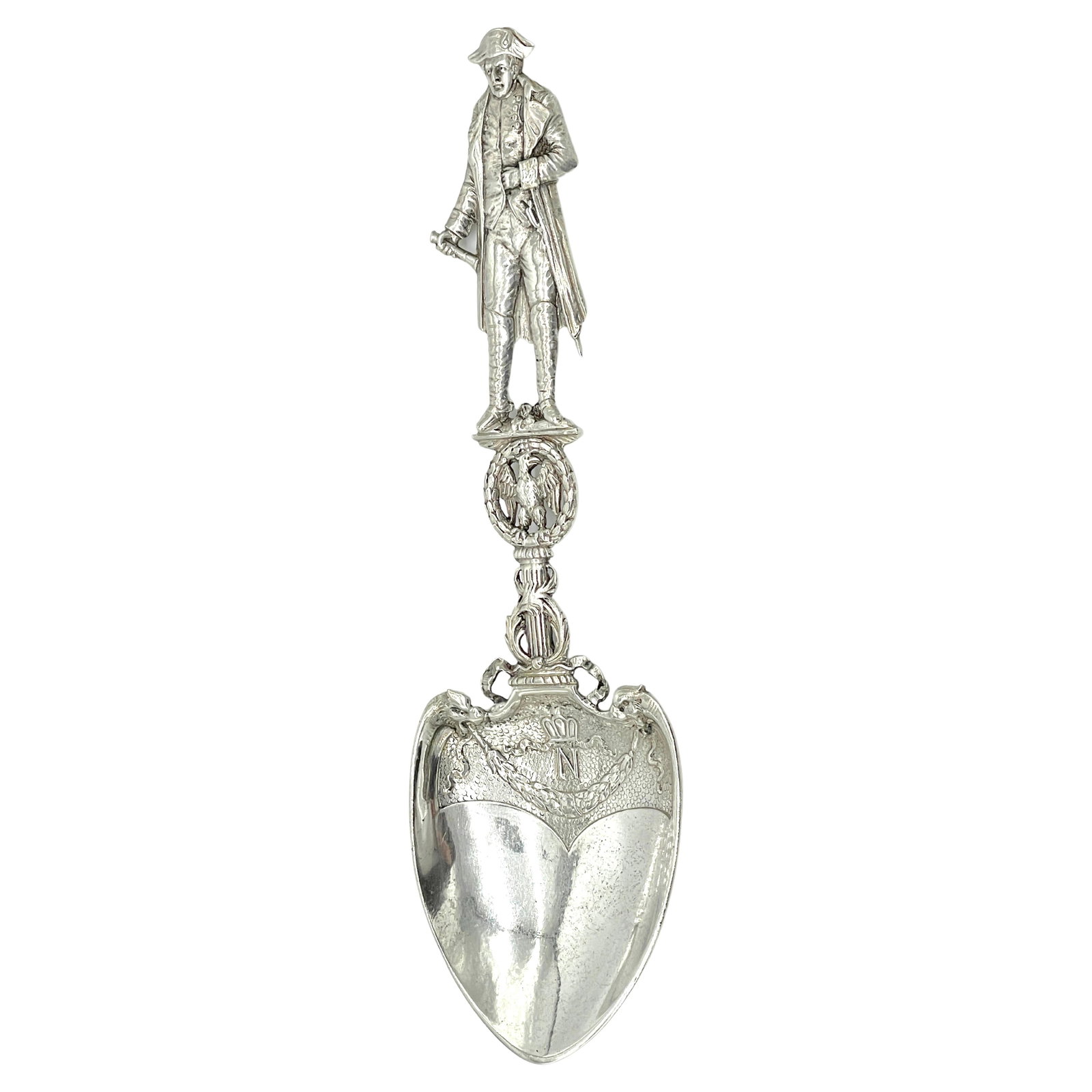 19th Century French Sterling Silver Napoleon Portrait Spoon: 19th Century French Sterling Silver Napoleon Portrait Spoon This exquisite 19th-century French silver commemorative spoon features a striking three-dimensional portrait of Napoleon Bonaparte, showcasi