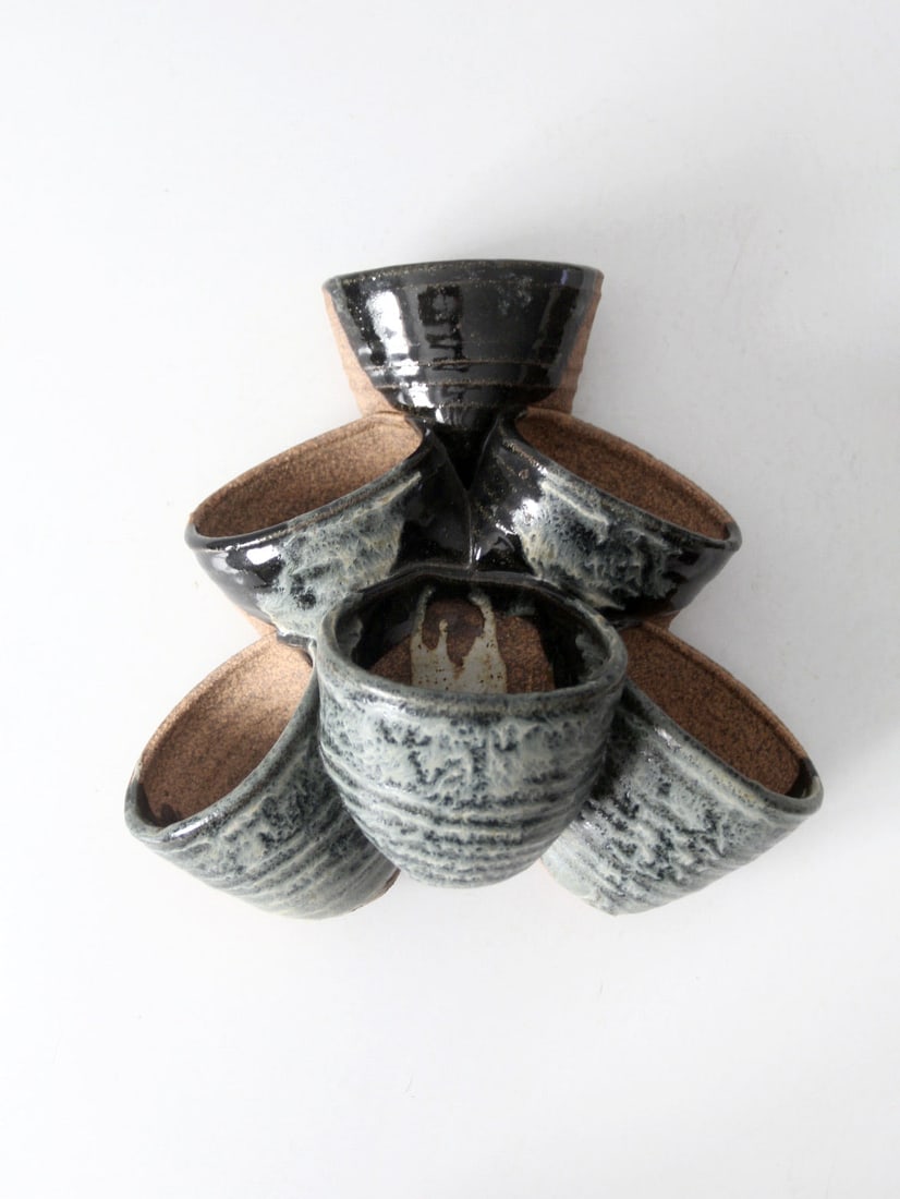 Vintage Studio Pottery Hanging Tiered Planter Vase Blue Black Glaze: Vintage Studio Pottery Hanging Tiered Planter Vase Blue Black Glaze Enhance your space with this charming vintage studio pottery tiered planter vase. This handcrafted piece showcases six interconnecte