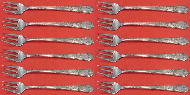 Lunt Sterling Silver Mary II Cocktail Forks Set of 12: Lunt Sterling Silver Mary II Cocktail Forks Set of 12 This exquisite set of 12 cocktail forks features the elegant Mary II pattern by Lunt. Each fork measures 5 1/2 inches and is crafted from