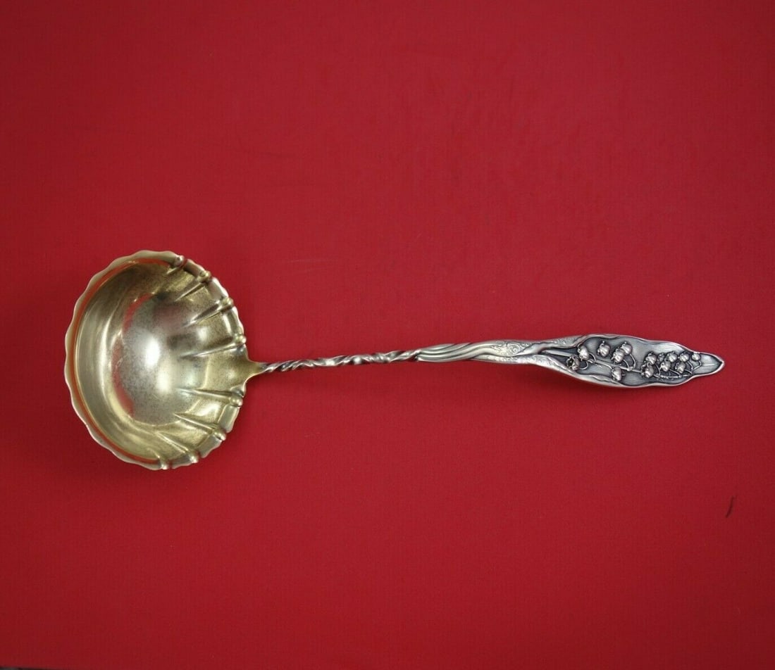 Whiting Lily of the Valley Sterling Silver Soup Ladle 11.5 inches Twisted Handle: Whiting Lily of the Valley Sterling Silver Soup Ladle 11.5 inches Twisted Handle This exquisite soup ladle is part of the Lily of the Valley pattern by Whiting, crafted from sterling silver. Featuring