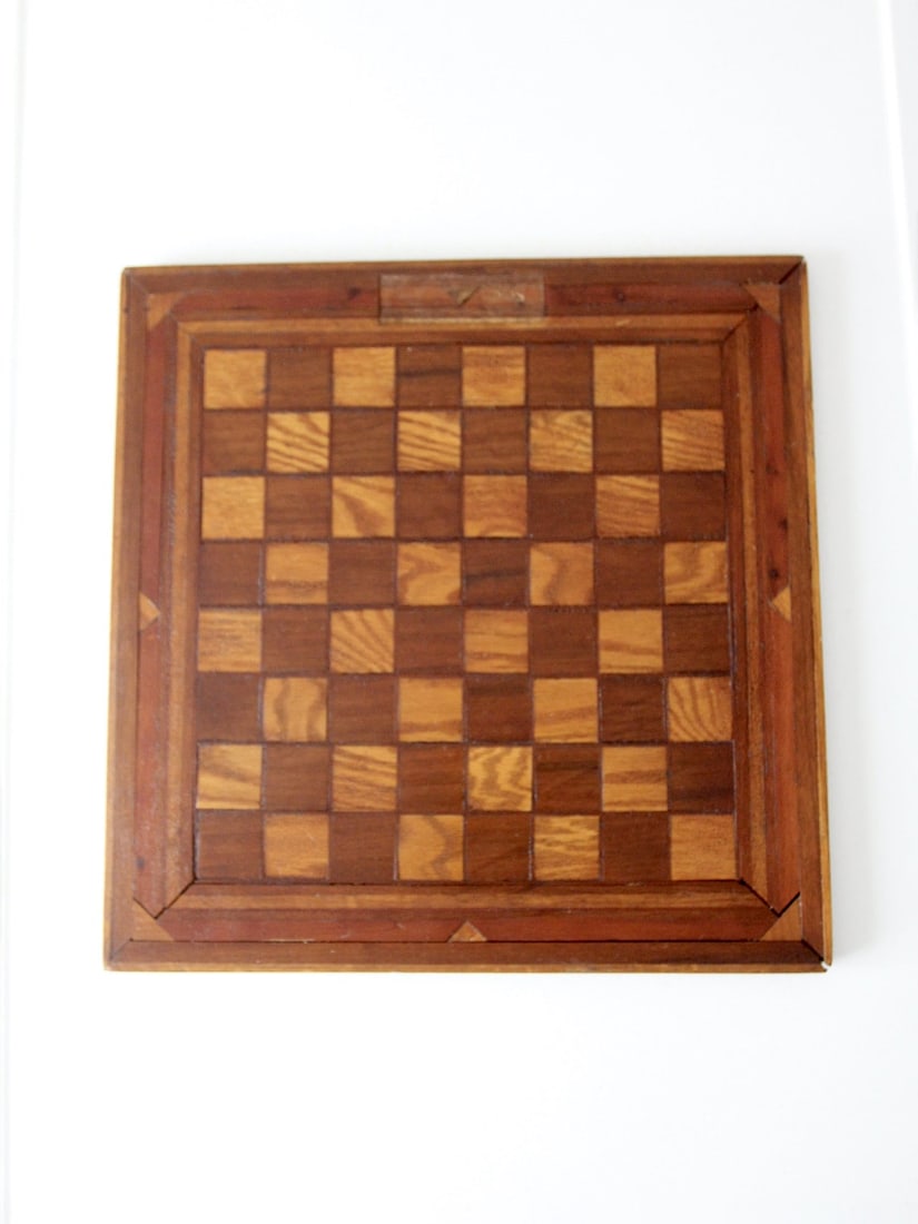 Antique Wooden Chessboard with Triangle Inlay 17.25 x 17.25: Antique Wooden Chessboard with Triangle Inlay 17.25 x 17.25 This exquisite antique wood chessboard showcases a beautiful wooden game board enhanced by a dynamic triangle wood inlay along its border. I