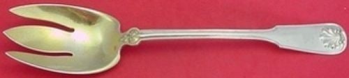 Tiffany & Co Shell and Thread Sterling Silver Salad Serving Fork 10": Tiffany & Co Shell and Thread Sterling Silver Salad Serving Fork 10" This elegant salad serving fork from Tiffany & Co. features the iconic Shell and Thread pattern, showcasing the brand's commitment