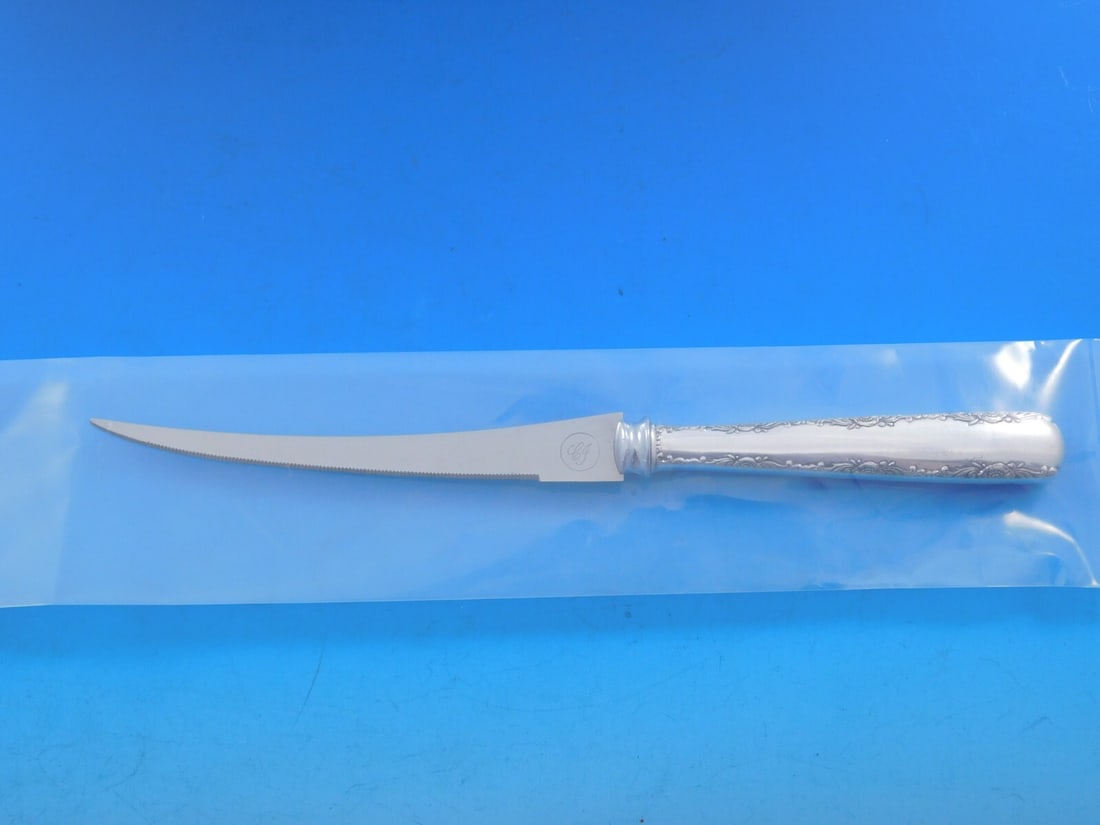 Gorham Camellia Sterling Silver Tomato Knife 8 Inch Custom Made: Gorham Camellia Sterling Silver Tomato Knife 8 Inch Custom Made This exquisite Camellia by Gorham Tomato Knife features a stunning sterling silver hollow handle and a sharp, serrated stainless steel b
