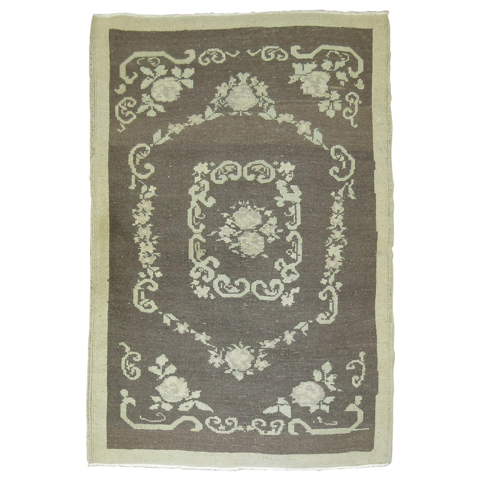 Mid Century Turkish Wool Hand Knotted Floral Scatter Rug: Mid Century Turkish Wool Hand Knotted Floral Scatter Rug This mid-20th century Turkish scatter size rug features a hand-knotted wool construction with a floral motif in gray and cream accents. Its cou