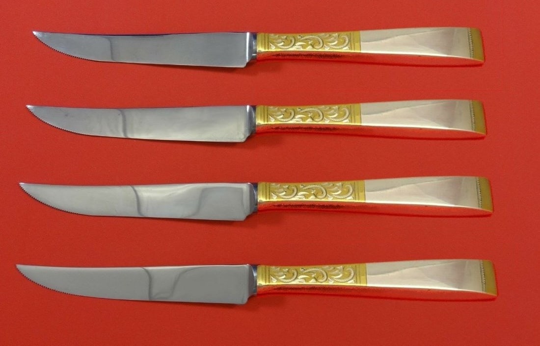Gorham Golden Scroll Sterling Silver Steak Knife Set 4pc 8 1/2": Gorham Golden Scroll Sterling Silver Steak Knife Set 4pc 8 1/2" This exquisite 4-piece steak knife set features the elegant Golden Scroll pattern by Gorham, crafted from high-quality sterling silver w