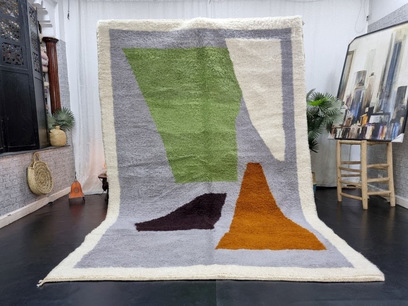 Handmade Moroccan Berber Wool Rug 9.84 x 6.56 Feet: Handmade Moroccan Berber Wool Rug 9.84 x 6.56 Feet Discover the beauty of this Elegant Authentic Soft Colorful Handmade Moroccan Berber Wool Area Rug. Handwoven in the Atlas Mountains by skilled local