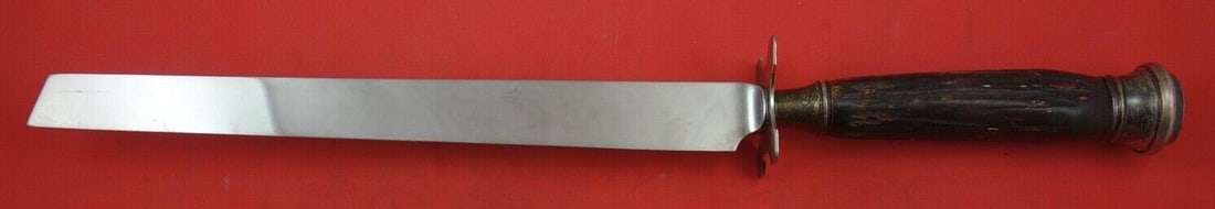 Vintage German Cake Knife with Antler Handle and Silver Ferrule 16.5": Vintage German Cake Knife with Antler Handle and Silver Ferrule 16.5" This exquisite cake knife features a unique antler handle crafted by various makers, complemented by a silver ferrule and cap. Dat