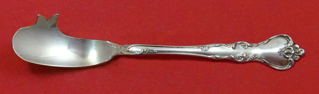 Reed and Barton Savannah Sterling Silver Cheese Knife with Pick 5 3/4 Custom: Reed and Barton Savannah Sterling Silver Cheese Knife with Pick 5 3/4 Custom This exquisite cheese knife, crafted by Reed and Barton, showcases the elegant Savannah pattern. Made from high-quality ste