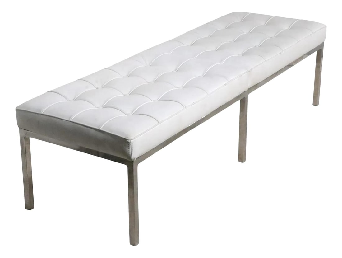 Sleek Mid Century Chrome and Vinyl Bench After Knoll: Sleek Mid Century Chrome and Vinyl Bench After Knoll This architectural minimalist bench features a sturdy chrome plated square stock base and a tufted white vinyl upholstered top. It is in very good,