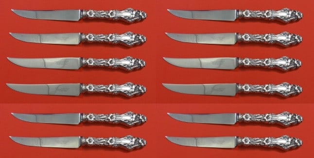 Lily Pattern by Whiting Sterling Silver Steak Knife Set 12 pcs 8 1/2 inch: Lily Pattern by Whiting Sterling Silver Steak Knife Set 12 pcs 8 1/2 inch Enhance your dining experience with this exquisite set of 12 steak knives from the renowned Lily pattern by Whiting. Crafted f