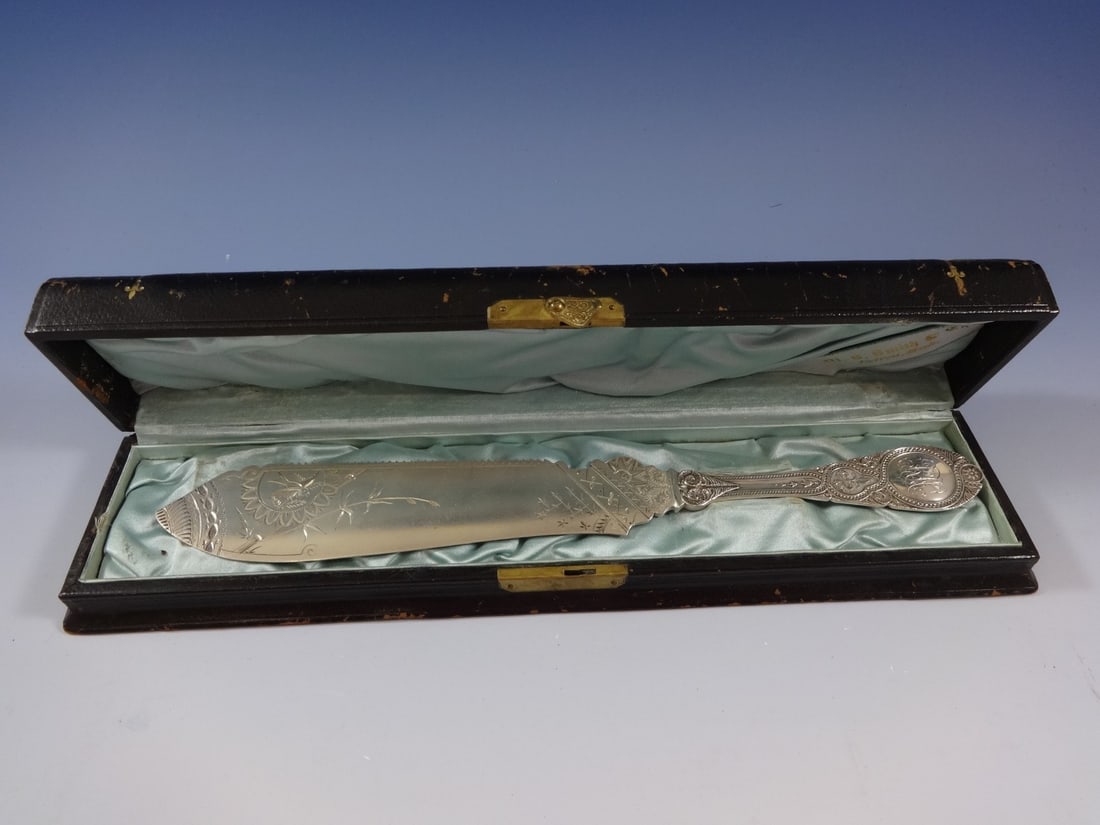 Wendt Moresque Sterling Silver 12 Inch Serrated Cake Knife Monogrammed in Box: Wendt Moresque Sterling Silver 12 Inch Serrated Cake Knife Monogrammed in Box This exquisite serrated cake knife, crafted by Wendt, is part of the Moresque pattern and dates back to 1873. Made entirel