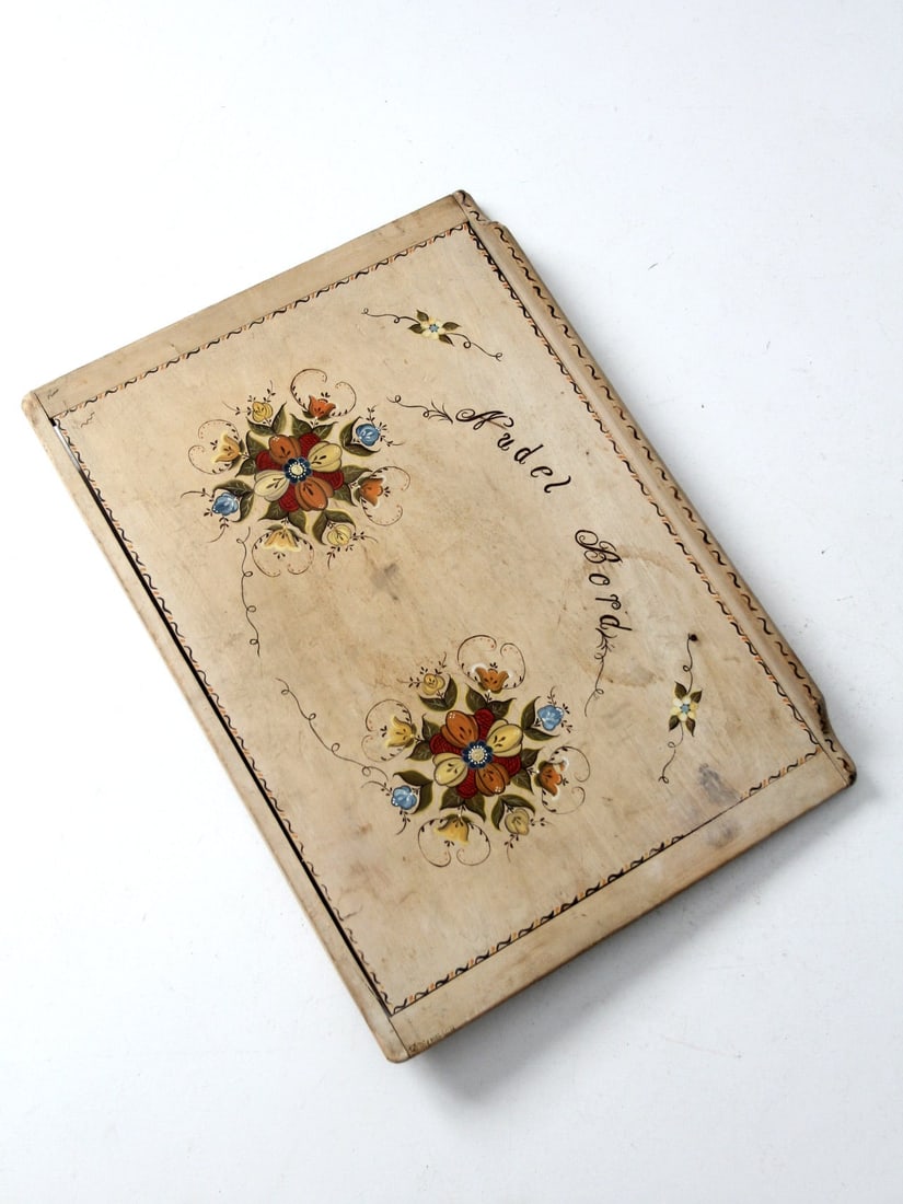 Antique German Hand Painted Noodle Board with Floral Design: Antique German Hand Painted Noodle Board with Floral Design This antique German noodle board is a charming addition to any kitchen. The traditional work board showcases a beautifully hand-painted disp