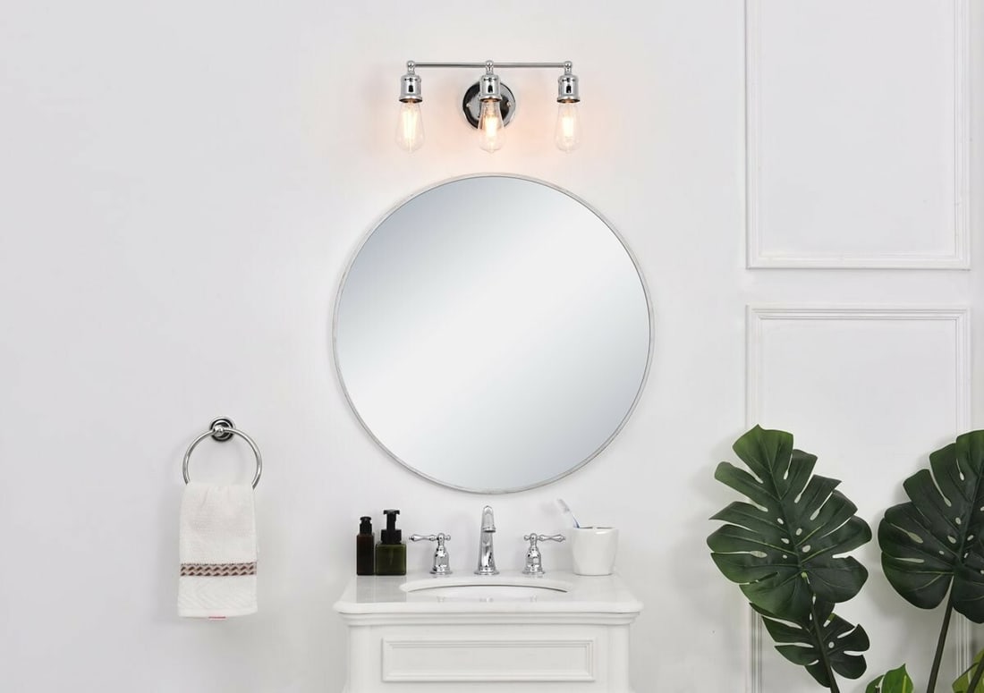 Serif 3-Light Chrome Wall Sconce 15.4 in: Serif 3-Light Chrome Wall Sconce 15.4 in This chrome wall sconce features a modern industrial design with a polished finish and metal construction. It is a hardwired indoor fixture with 3-light config