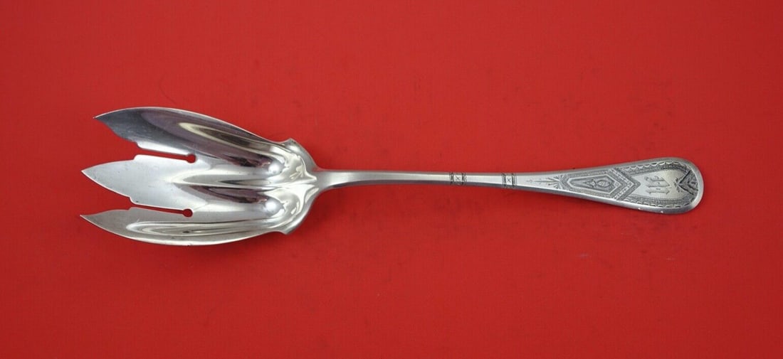 Tiffany & Co King William Engraved Sterling Silver Serving Fork 10.5": Tiffany & Co King William Engraved Sterling Silver Serving Fork 10.5" Elevate your dining experience with this exquisite Sterling Silver Salad Serving Fork from Tiffany & Co., part of the prestigious 