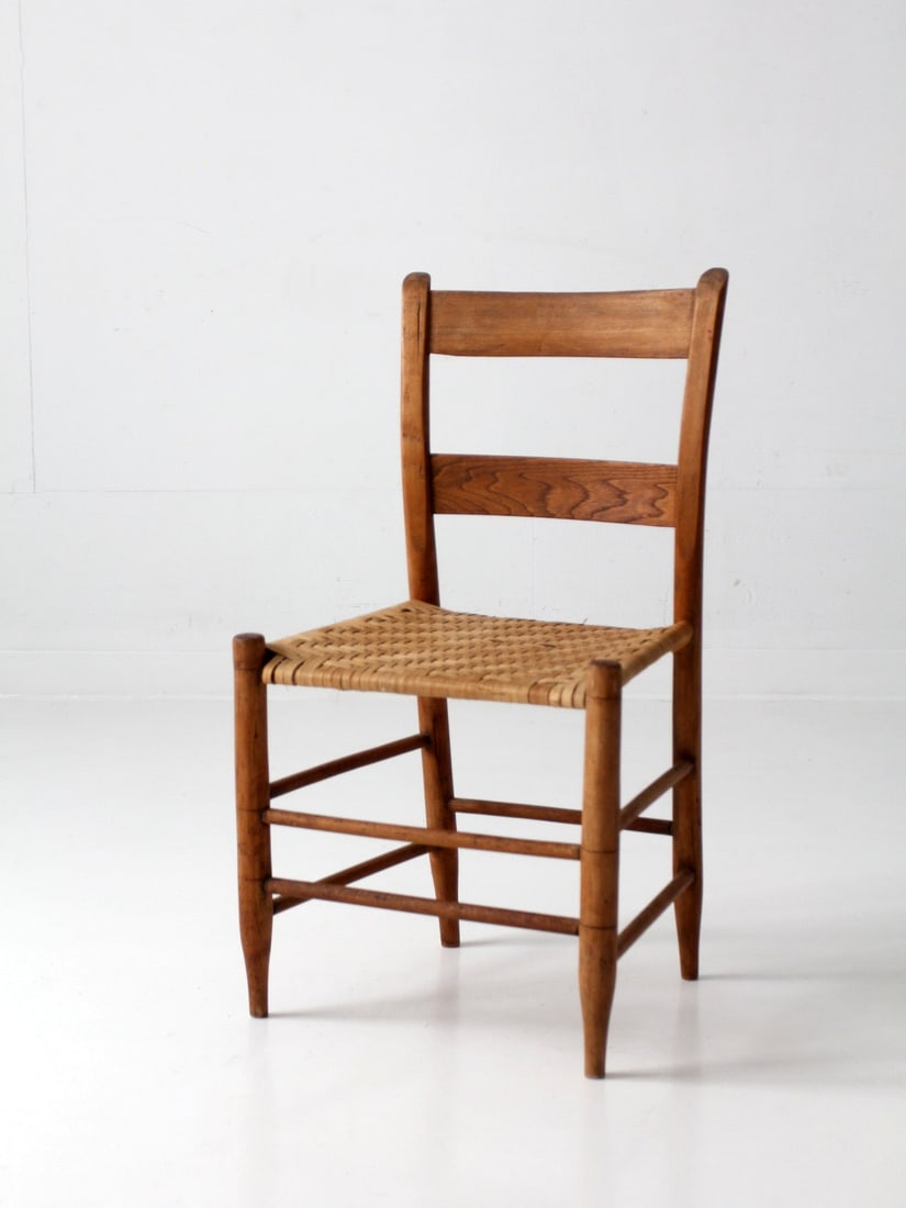 Late 19th Century Ladderback Chair Herringbone Splint Seat: Late 19th Century Ladderback Chair Herringbone Splint Seat This late 19th century ladder back chair features gently curved slats, tapered legs, and a handwoven splint seat crafted in a traditional her