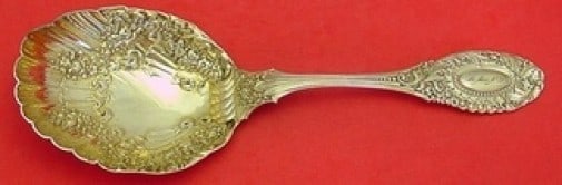 Durgin Sterling Silver Berry Spoon No Pattern Gold Wash Shell Bowl 8 7/8": Durgin Sterling Silver Berry Spoon No Pattern Gold Wash Shell Bowl 8 7/8" This exquisite berry spoon from Durgin is crafted from high-quality sterling silver and features a luxurious gold wash. The sp