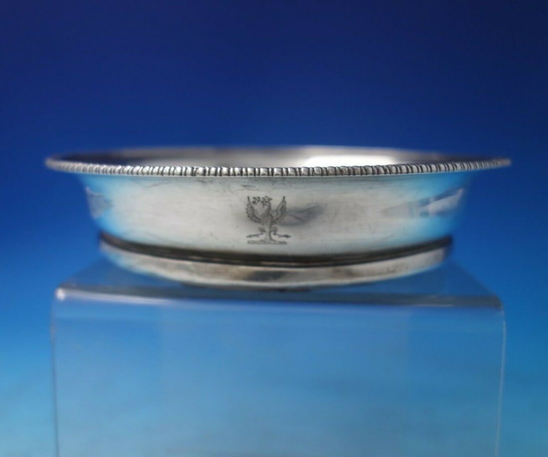 Neresheimer & Sohne .800 Silver Eagle Champagne Coaster with Wood Base: Neresheimer & Sohne .800 Silver Eagle Champagne Coaster with Wood Base This exquisite champagne coaster from Neresheimer & Sohne showcases a stunning combination of .800 silver and a wooden base. Craf