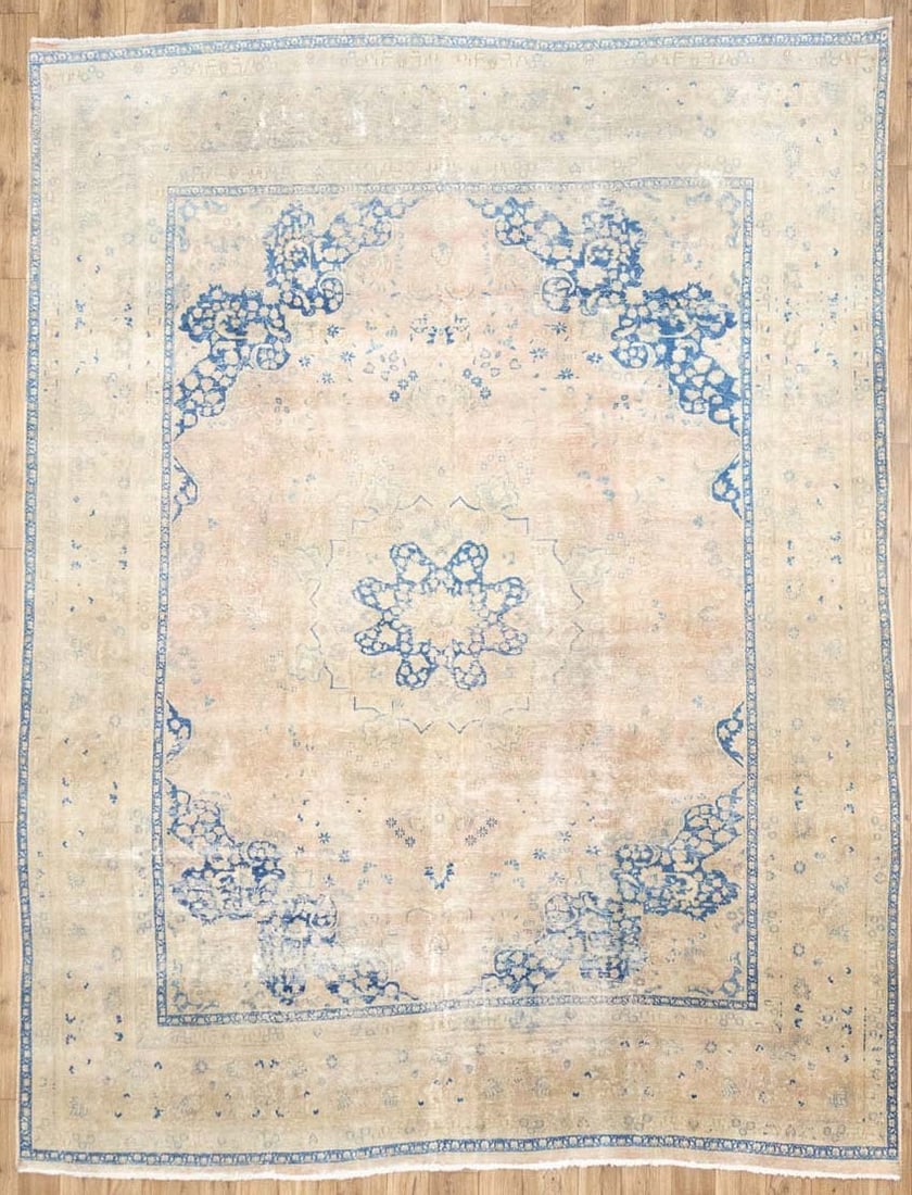 Hand Knotted Wool Floral Tribal Rug 9'5 x 12'2: Hand Knotted Wool Floral Tribal Rug 9'5 x 12'2 This semi-antique hand-knotted Oriental area rug features a distressed floral pattern in muted tones of beige, blue, cream, and brown. Crafted from wool,