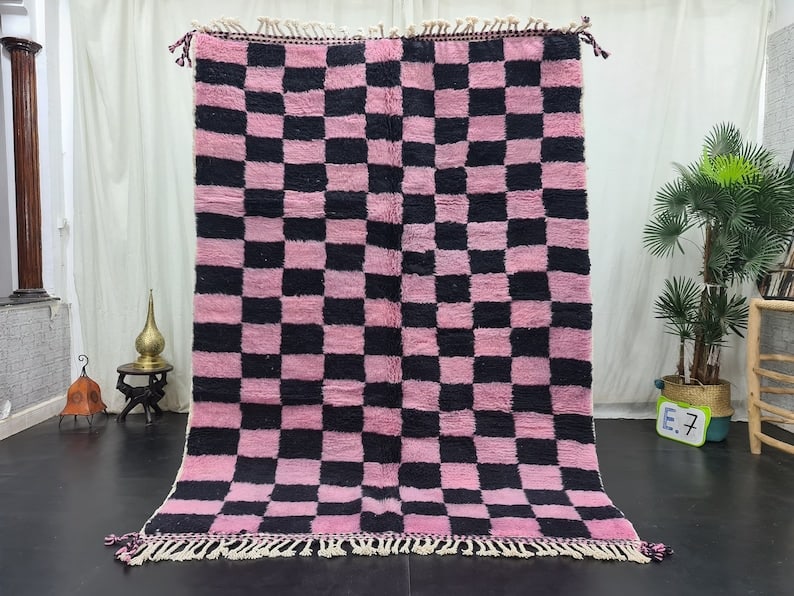 Handwoven Black Pink Moroccan Rug 8 x 5 Feet 100% Wool: Handwoven Black Pink Moroccan Rug 8 x 5 Feet 100% Wool This stunning black pink rug is expertly handwoven in the Atlas Mountains by local Berber women weavers using traditional methods and natural woo