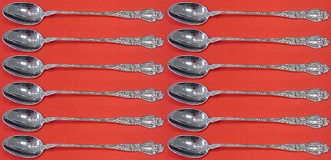 Frank Whiting Lily Sterling Silver Iced Tea Spoon Set of 12: Frank Whiting Lily Sterling Silver Iced Tea Spoon Set of 12 This exquisite set of 12 iced tea spoons features the elegant "Lily" pattern by Frank Whiting, crafted from high-quality sterling silver. Ea