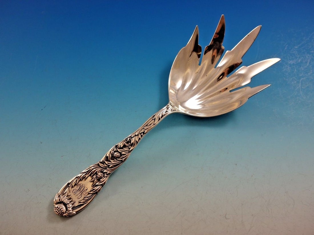 Tiffany & Co. Sterling Silver Macaroni Fork Chrysanthemum Pattern 8.25 Inch: Tiffany & Co. Sterling Silver Macaroni Fork Chrysanthemum Pattern 8.25 Inch This macaroni serving fork is crafted from sterling silver in the Chrysanthemum pattern by Tiffany & Co. Dating from 1850-18