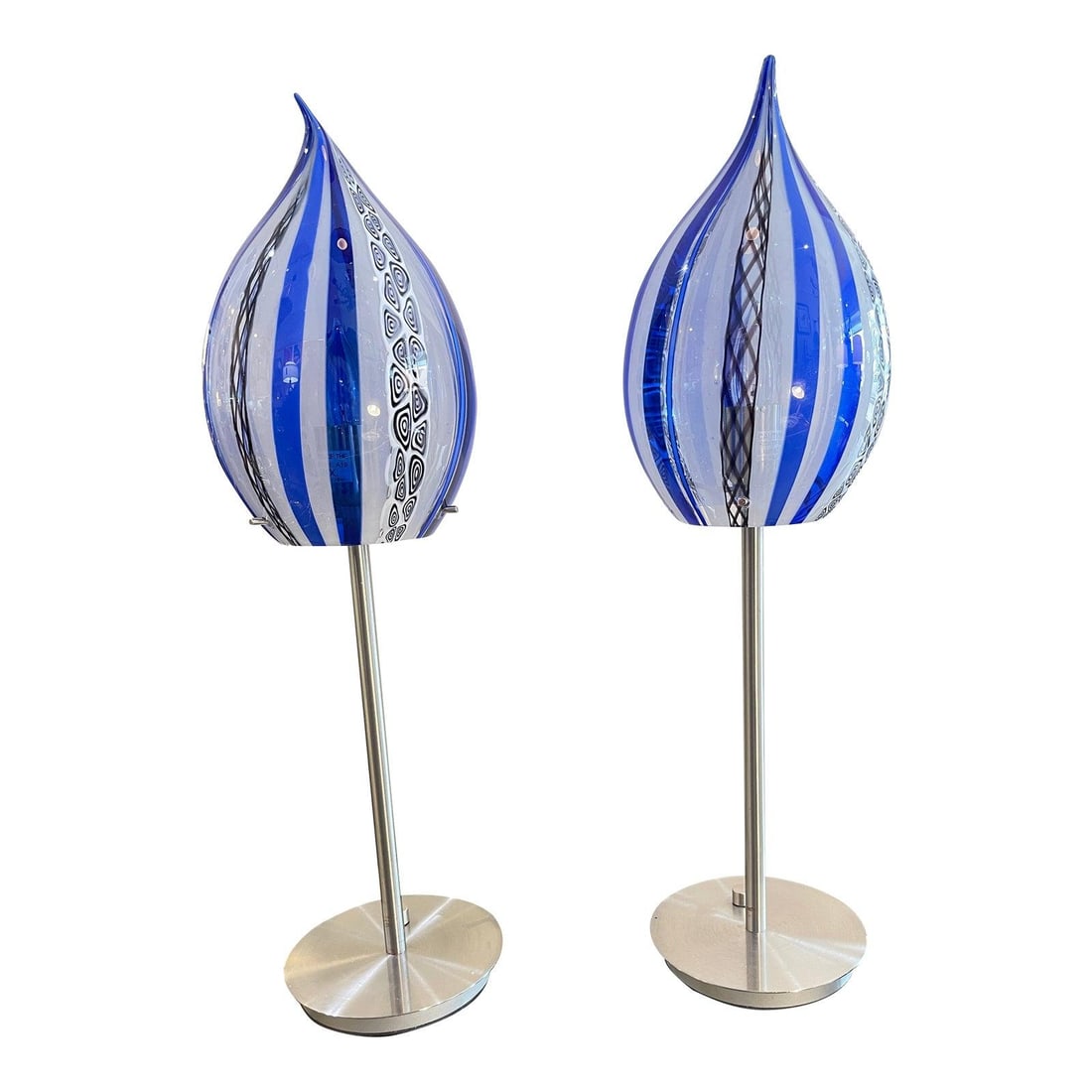 Vintage Murano Glass Latticino Blue and White Lamps with Nickel Base: Vintage Murano Glass Latticino Blue and White Lamps with Nickel Base This exquisite pair of Murano Glass Latticino lamps showcases a striking blue and white design, perfect for adding a touch of elega