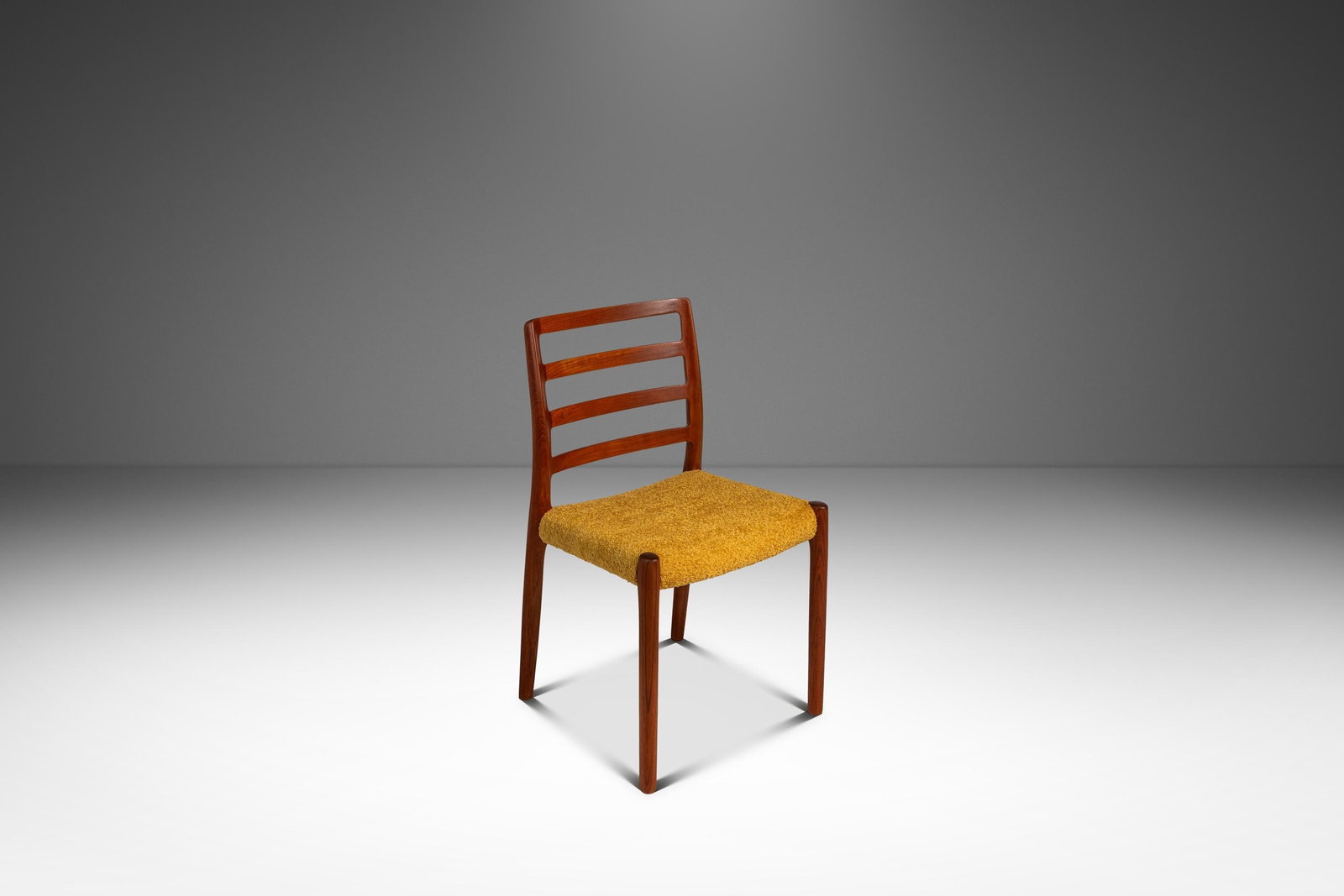 Niels Moller Model 85 teak ladderback dining chair: Niels Moller Model 85 teak ladderback dining chair This is a fully restored Danish Mid-Century Modern Model 85 ladderback dining chair designed by Niels Moller for J.L. Moller, crafted in Denmark in t