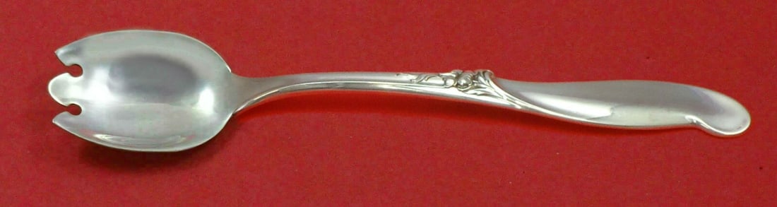 International Sterling Silver Silver Melody Ice Cream Fork 6 Inch: International Sterling Silver Silver Melody Ice Cream Fork 6 Inch Indulge in elegant dining with this exquisite Sterling Silver Ice Cream Dessert Fork from the renowned Silver Melody pattern by Intern