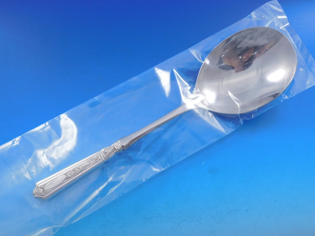Gorham Saint Dunstan Chased Sterling Silver Casserole Spoon Custom Made 11 1/8": Gorham Saint Dunstan Chased Sterling Silver Casserole Spoon Custom Made 11 1/8" This exquisite casserole spoon features the elegant Saint Dunstan Chased pattern by Gorham. Crafted from high-quality st