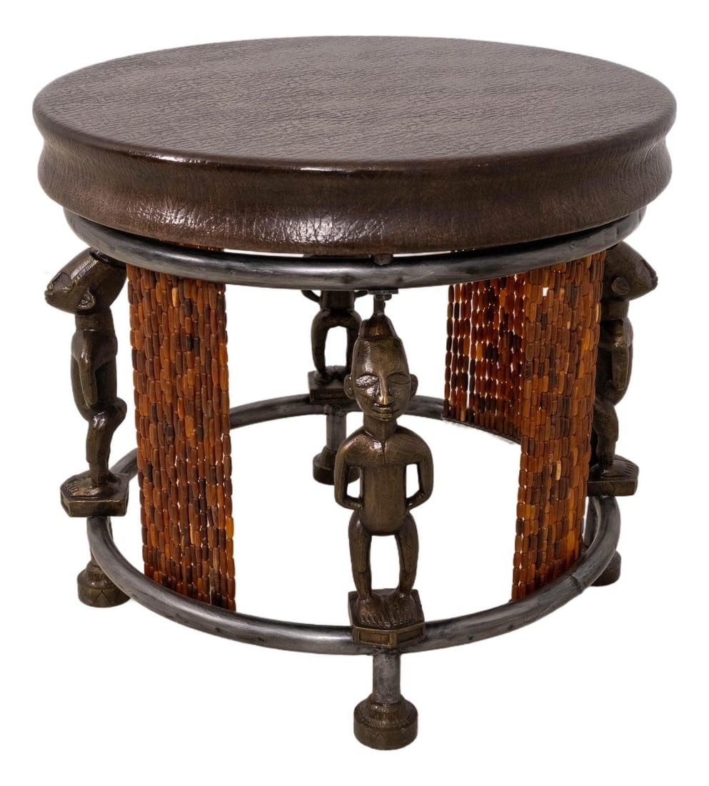 African Motif Leather Accent Table With Congo Figures 24W x 24D x 22H: African Motif Leather Accent Table With Congo Figures 24W x 24D x 22H This end table features a textured leather top with a distinctive African-inspired design, including Congo figures. Crafted with h