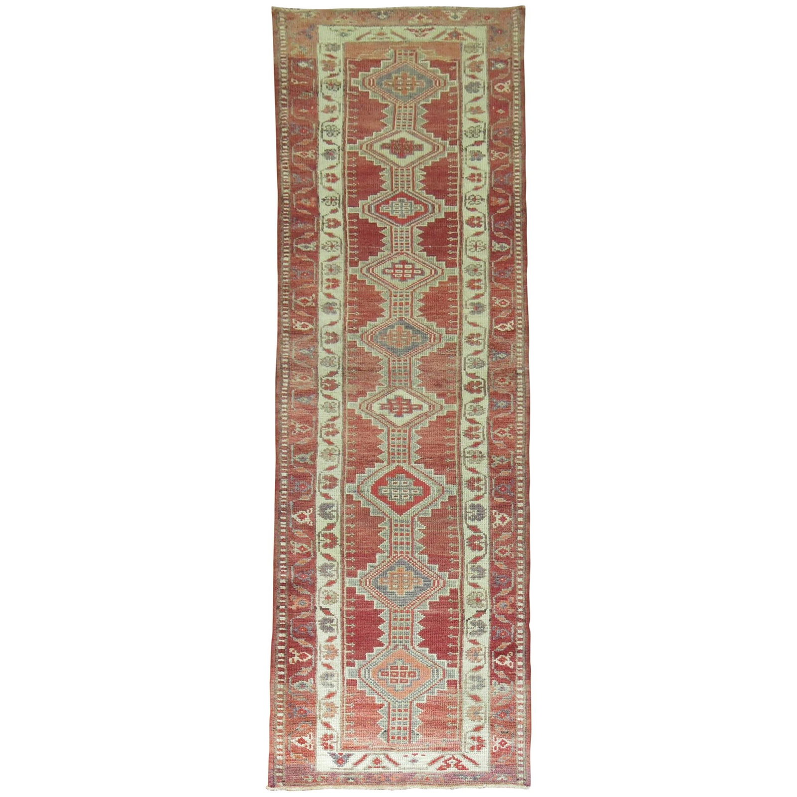 Mid Century Wool Hand Knotted Turkish Geometric Runner: Mid Century Wool Hand Knotted Turkish Geometric Runner This vintage Turkish runner features a striking geometric tribal motif in brick red tones. Hand-knotted from wool, it reflects the country style 