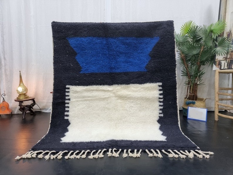 Handmade Moroccan Berber Rug 100% Wool 9.84 x 6.56 Feet: Handmade Moroccan Berber Rug 100% Wool 9.84 x 6.56 Feet Elevate your space with this stunning Handmade Moroccan Berber Rug, meticulously crafted by skilled local Berber women weavers from the Middle A