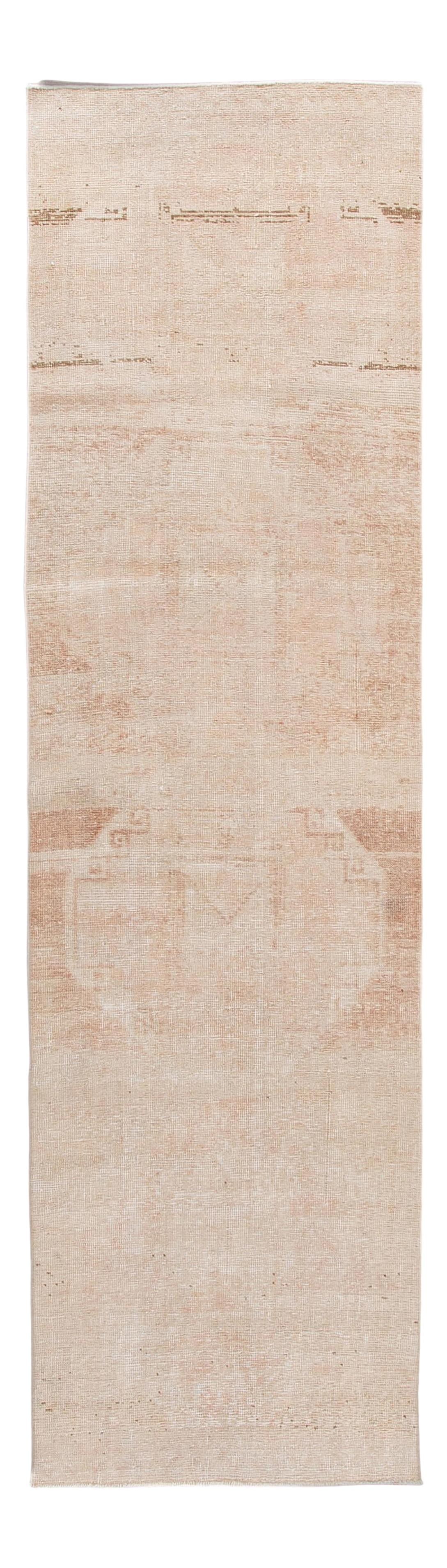 Vintage 1960s Turkish Handmade Tan Wool Tribal Runner 3' x 10'10: Vintage 1960s Turkish Handmade Tan Wool Tribal Runner 3' x 10'10 Discover the charm of a vintage Turkish handmade wool runner, featuring a rich tan field complemented by beige accents. This exquisite 