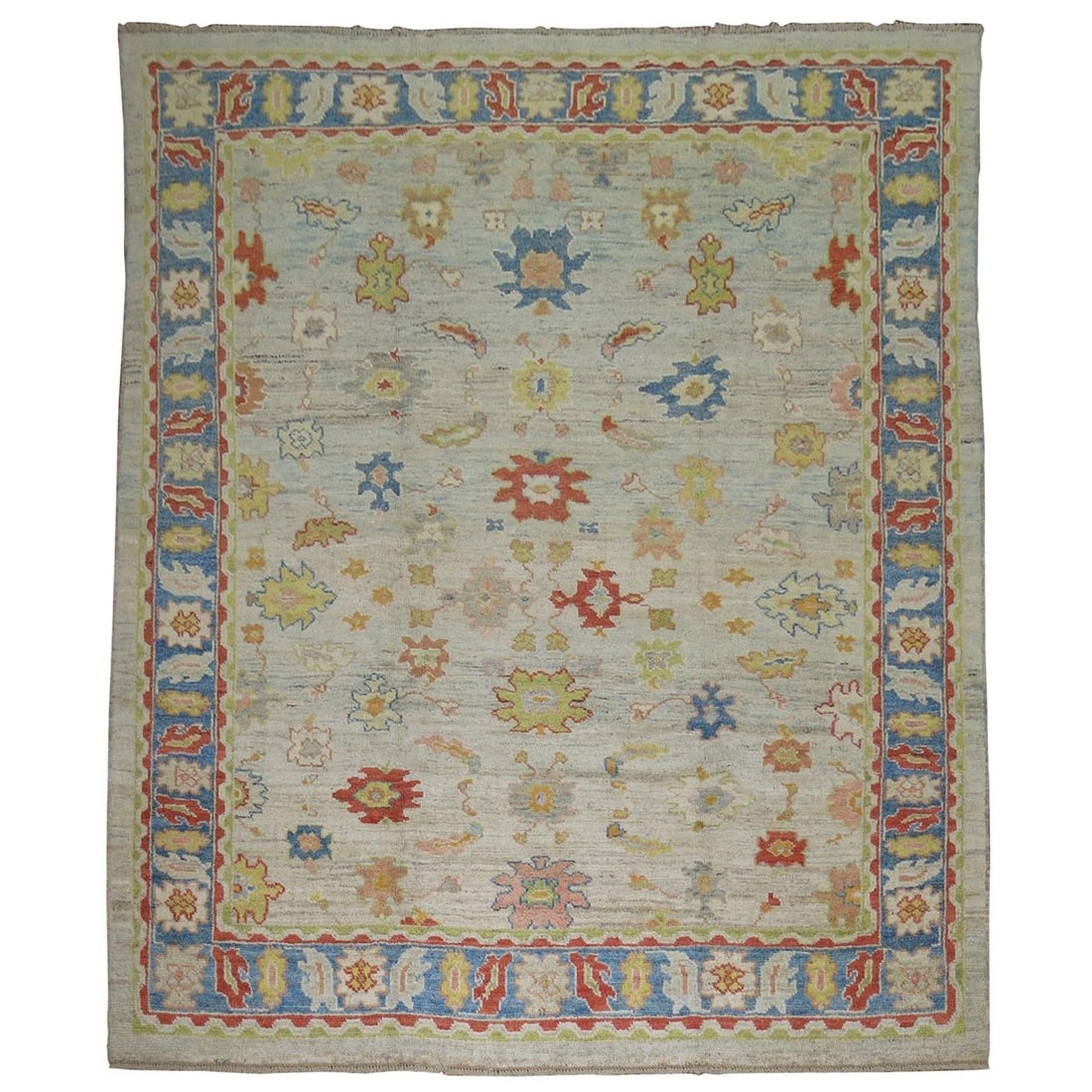 Hand-Knotted Turkish Oushak Square Wool Rug in Powder Blue: Hand-Knotted Turkish Oushak Square Wool Rug in Powder Blue This is a hand-knotted, one-of-a-kind Turkish Oushak carpet featuring a vintage-inspired square design in powder blue tones. Crafted from woo