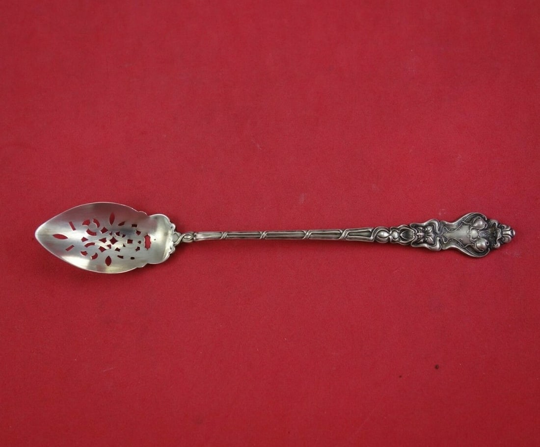 Unger Douvaine Sterling Silver Pierced Olive Spoon 6 1/4": Unger Douvaine Sterling Silver Pierced Olive Spoon 6 1/4" Experience the elegance of the Douvaine pattern with this exquisite pierced olive spoon by Unger. Crafted from high-quality sterling silver, t