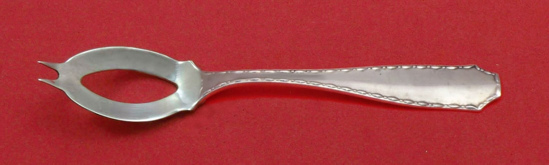 Tiffany & Co. Marquise Sterling Silver Olive Spoon Custom 5 1/4 Inch: Tiffany & Co. Marquise Sterling Silver Olive Spoon Custom 5 1/4 Inch Discover the elegance of this custom-made olive spoon from Tiffany & Co., crafted in sterling silver. This exquisite piece, part of