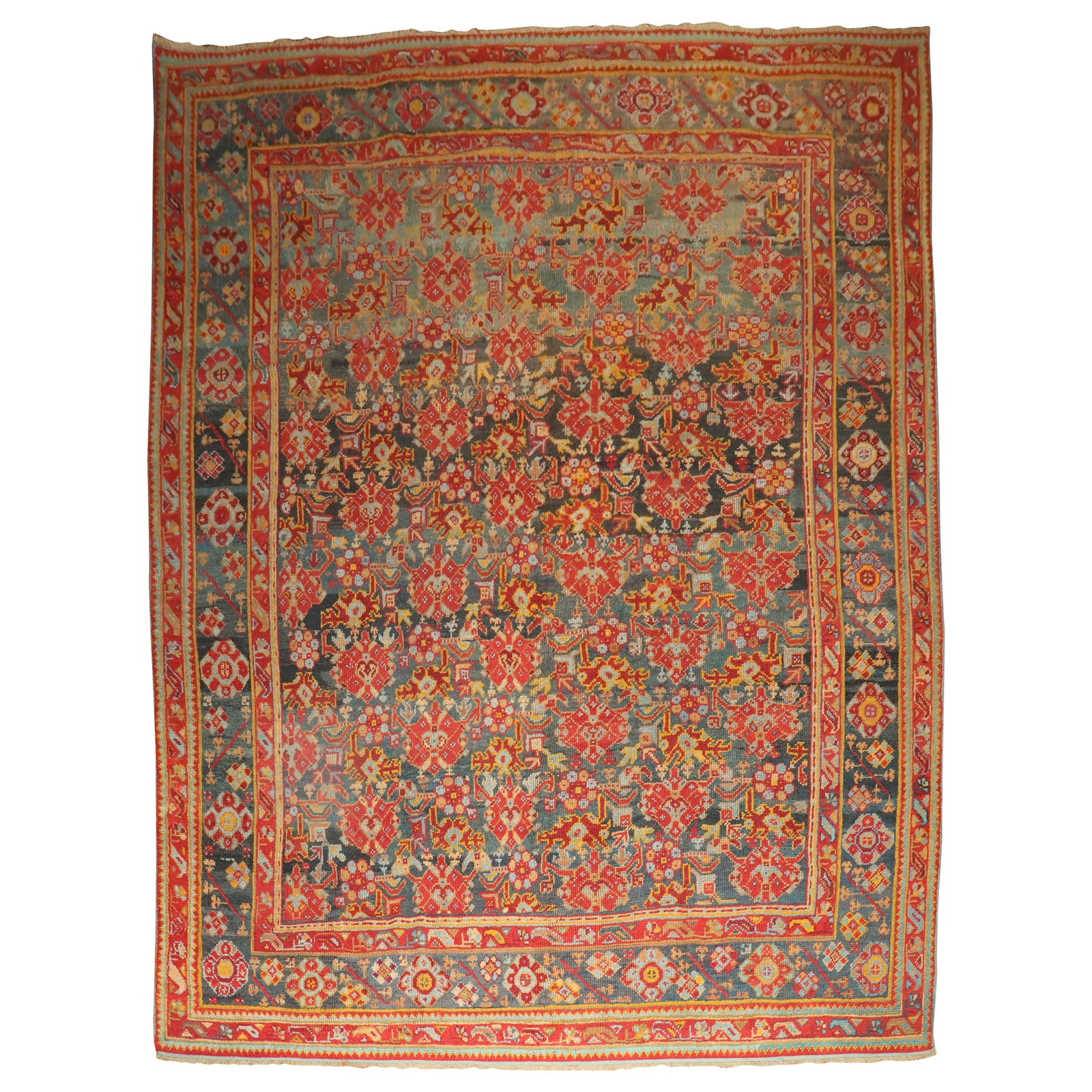 Early 20th Century Turkish Antique Oushak Wool Room Rug 9'6 x 12'10: Early 20th Century Turkish Antique Oushak Wool Room Rug 9'6 x 12'10 This exquisite Antique Turkish Oushak Room Rug is a stunning addition to any home decor. Crafted from high-quality wool, this hand-k
