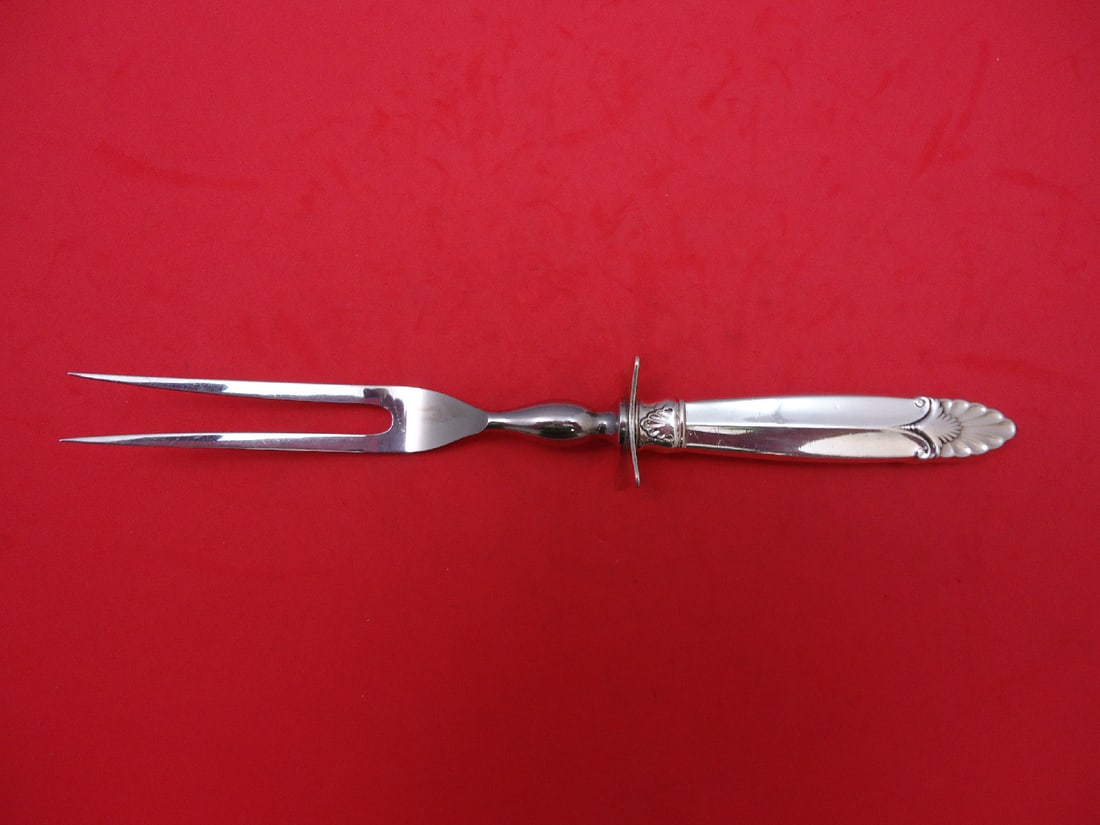 International Sterling Silver Empress 8 3/4" Carving Fork: International Sterling Silver Empress 8 3/4" Carving Fork Discover the elegance of the Empress pattern with this exquisite 8 3/4" serving fork by International Sterling. Crafted from high-quality ster