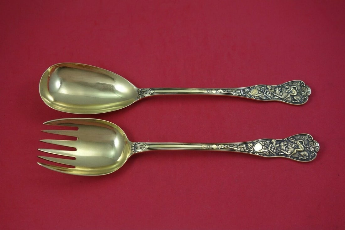 English Sterling Silver Bacchanalian Vermeil Salad Serving Set 2pc 10.5 Inch: English Sterling Silver Bacchanalian Vermeil Salad Serving Set 2pc 10.5 Inch This is a 2-piece English sterling silver Bacchanalian salad serving set with vermeil (gold) finish. The set includes a 10 