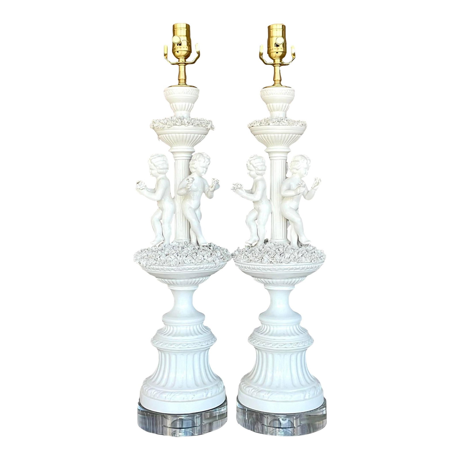 Pair of Vintage Regency Putti Style Ceramic Table Lamps: Pair of Vintage Regency Putti Style Ceramic Table Lamps Enhance your home decor with this exquisite pair of vintage Regency table lamps, beautifully crafted in the Putti style featuring charming cheru