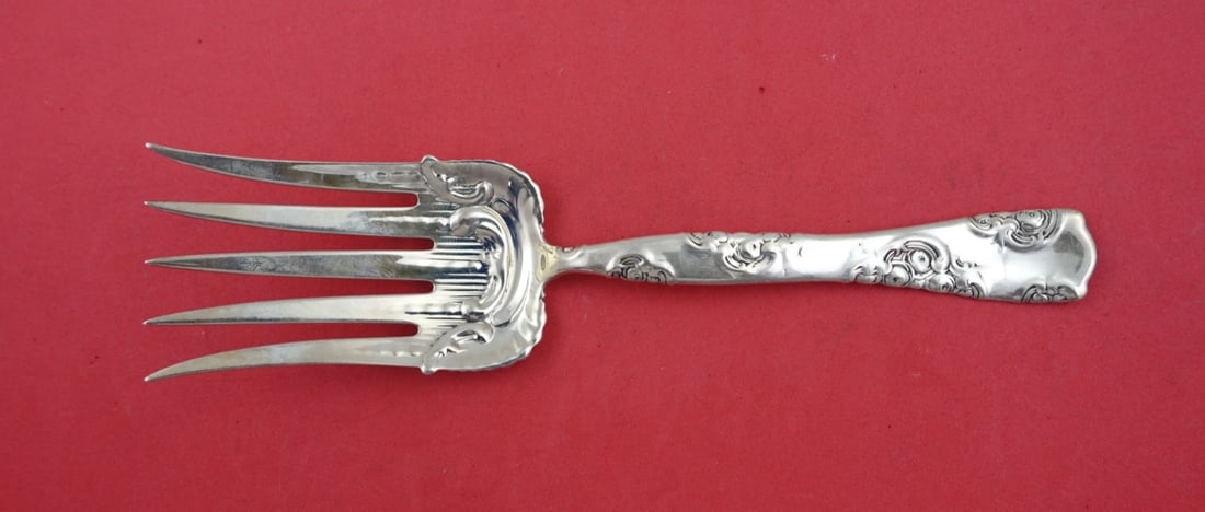 Whiting Rose and Scroll Sterling Silver Fish Serving Fork 5-Tine 7 7/8": Whiting Rose and Scroll Sterling Silver Fish Serving Fork 5-Tine 7 7/8" This exquisite serving fork features the elegant Rose and Scroll pattern by Whiting, crafted from high-quality sterling silver. 