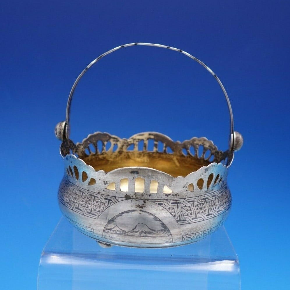 Russian 875 Silver Sugar Basket Swing Handle Gold Wash Interior: Russian 875 Silver Sugar Basket Swing Handle Gold Wash Interior This exquisite Russian sugar basket is crafted from 875 silver, featuring a charming swing handle and a beautifully scalloped pierced ri
