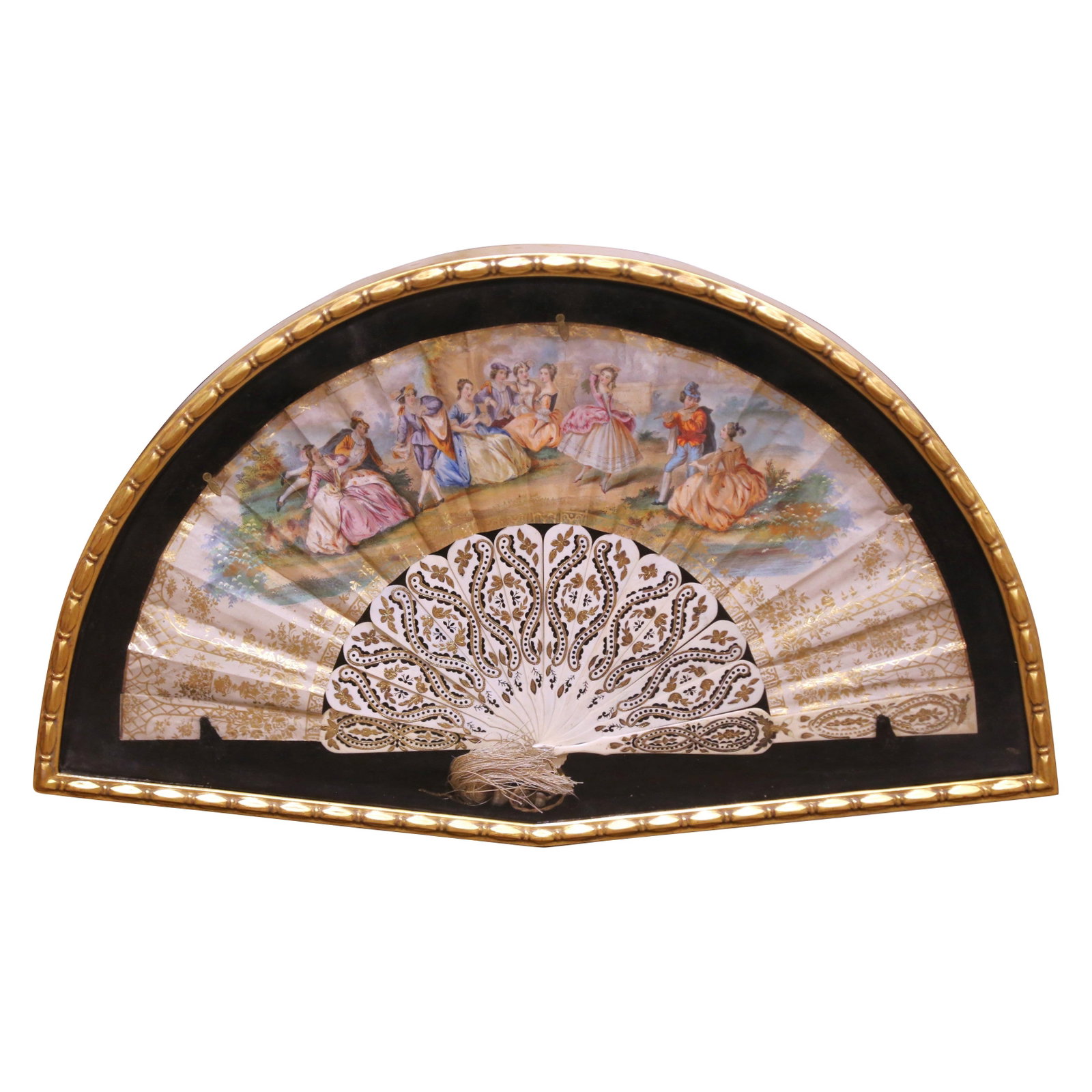 Napoleon III Era French Framed Hand-Painted Fan with Bone Details: Napoleon III Era French Framed Hand-Painted Fan with Bone Details This mid-19th century French hand-painted fan is elegantly displayed within a carved giltwood frame and protected under glass. Crafted