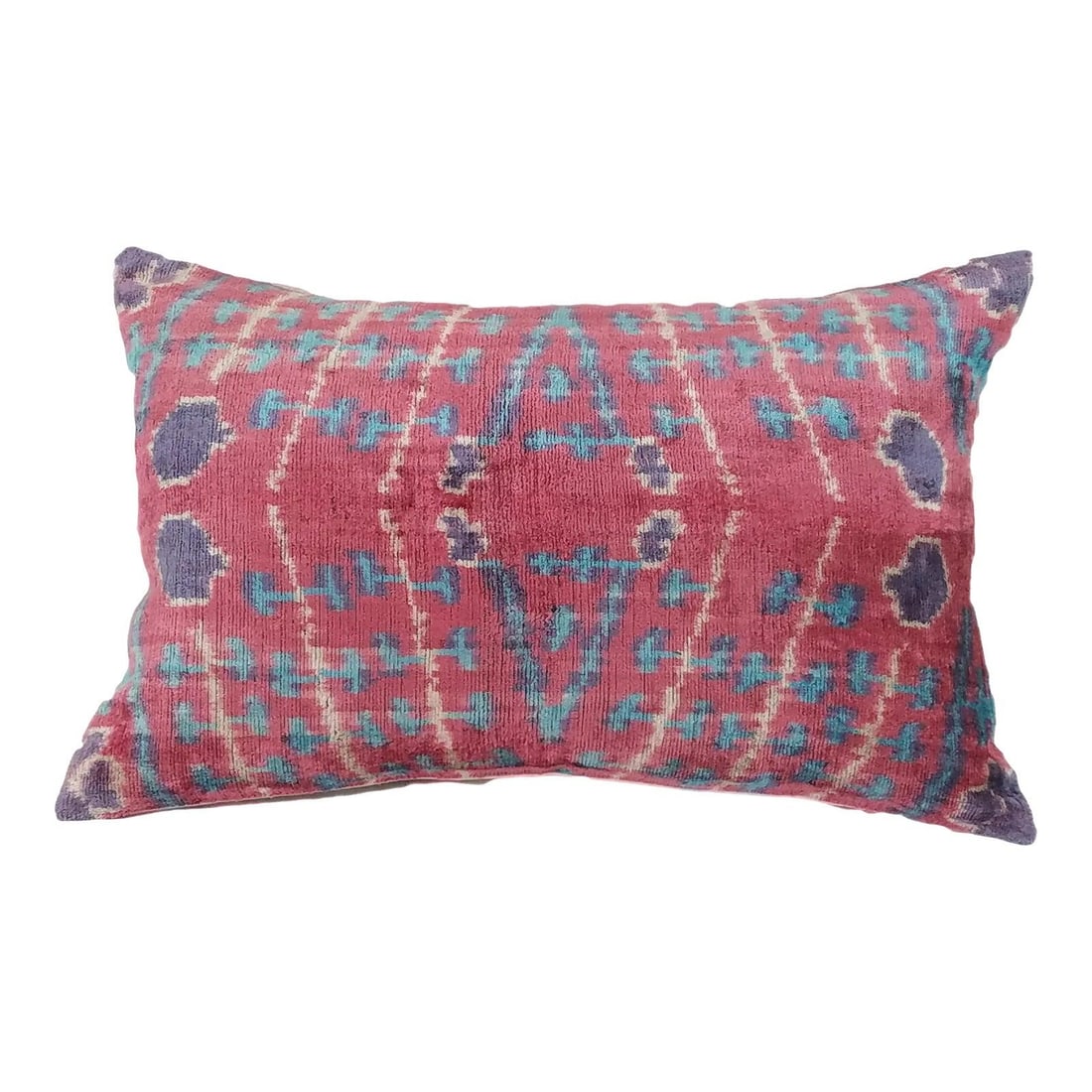 Handcrafted Uzbek Ikat Silk Velvet Pillow with Linen Backing and Feather Insert: Handcrafted Uzbek Ikat Silk Velvet Pillow with Linen Backing and Feather Insert This hand made pillow cushion features a silk Uzbek Ikat velvet front with a natural linen backing and a hidden zipper f