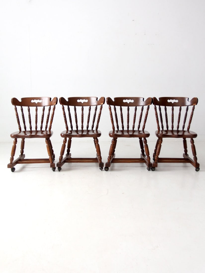 Vintage Tell City Tavern Chairs Set of 4 with Casters: Vintage Tell City Tavern Chairs Set of 4 with Casters Enhance your dining experience with this set of four vintage Tell City tavern chairs, designed in a classic pub style. Each chair features elegant