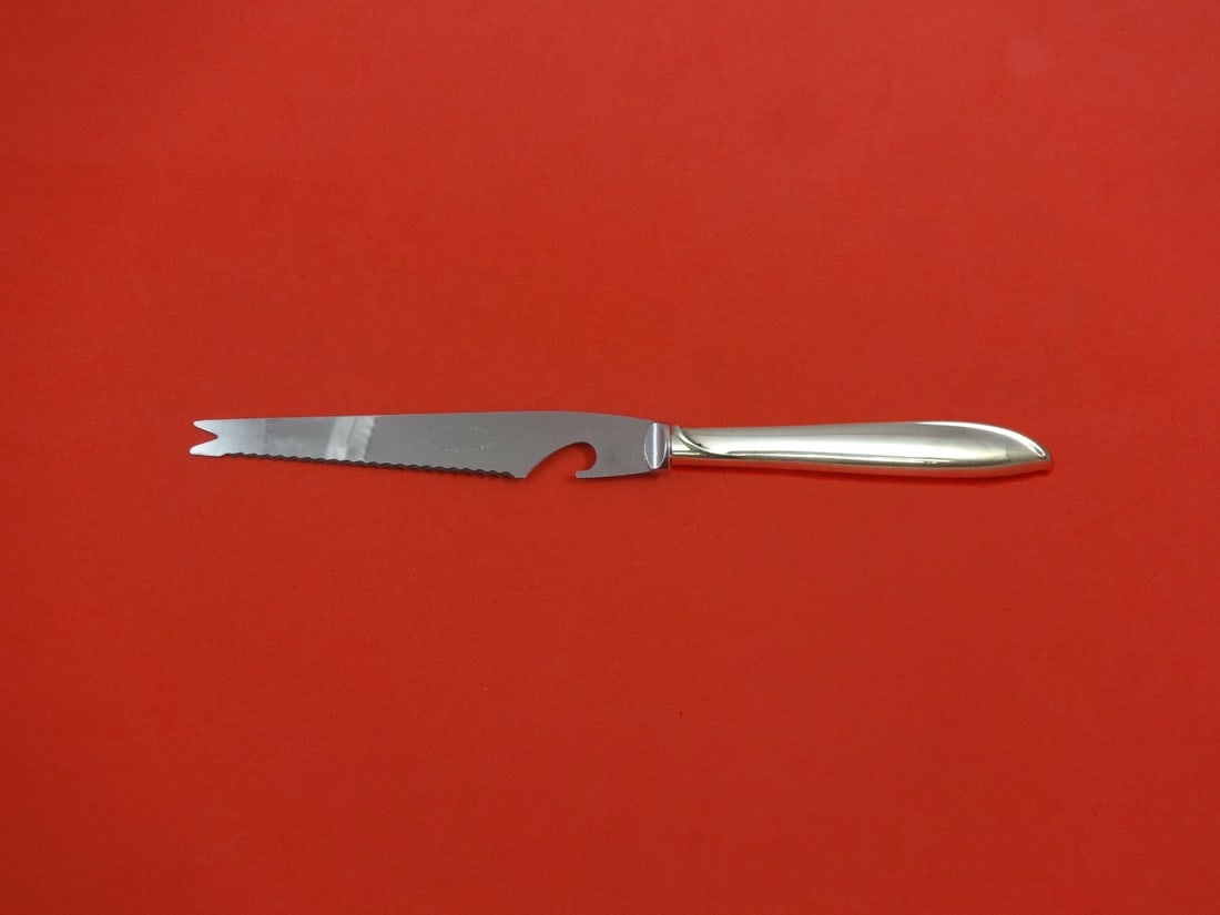 International Sterling Silver Rhythm Bar Knife Custom Made 9 1/8 Inch: International Sterling Silver Rhythm Bar Knife Custom Made 9 1/8 Inch This exquisite Silver Rhythm knife is crafted by International Sterling, showcasing a beautiful hollow handle design made from ste