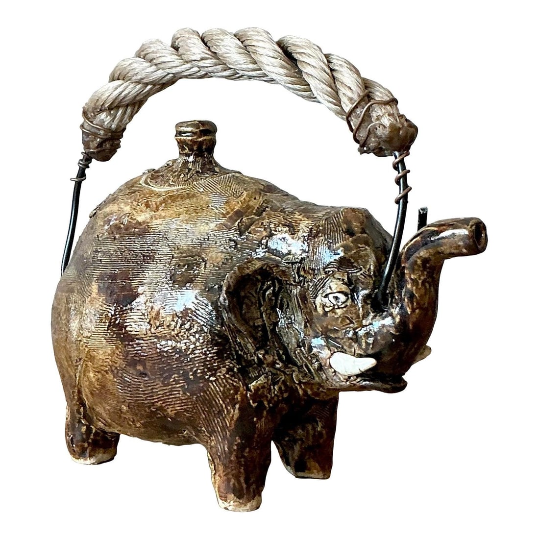 Boho Ceramic Elephant Teapot with Rope Handle: Boho Ceramic Elephant Teapot with Rope Handle This vintage studio pottery teapot is expertly hand-sculpted in the form of an elephant, featuring a whimsical bohemian design. The piece is finished with