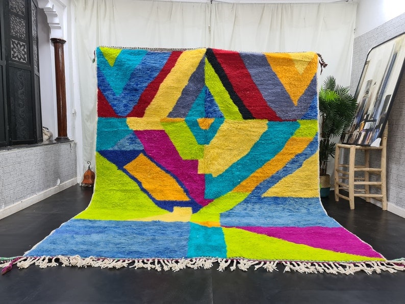 Authentic Colorful Handmade Wool Rug from Morocco 10 x 6.56 Feet: Authentic Colorful Handmade Wool Rug from Morocco 10 x 6.56 Feet Enhance your space with this luxurious and vibrant handmade rug. Expertly crafted by local Berber women weavers in the picturesque Midd